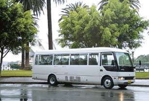 25 seat Mitsubishi Rosa coach for hire, rent and charter